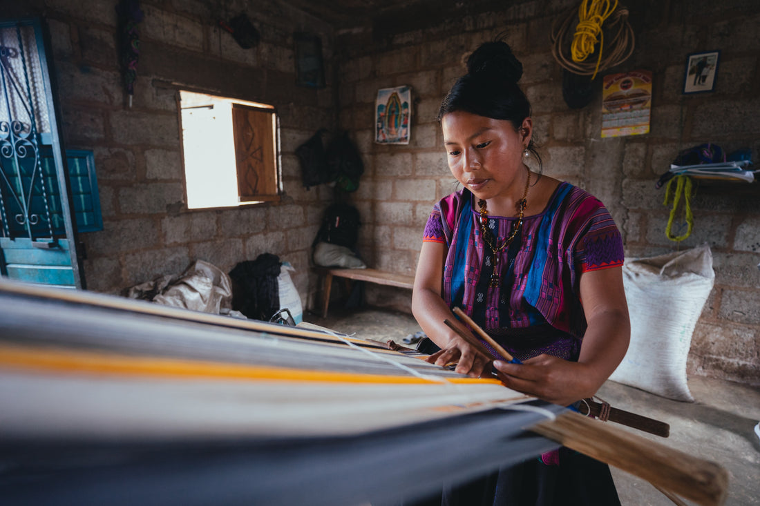 woman working on textile production