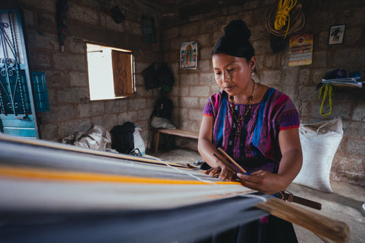 woman working on textile production
